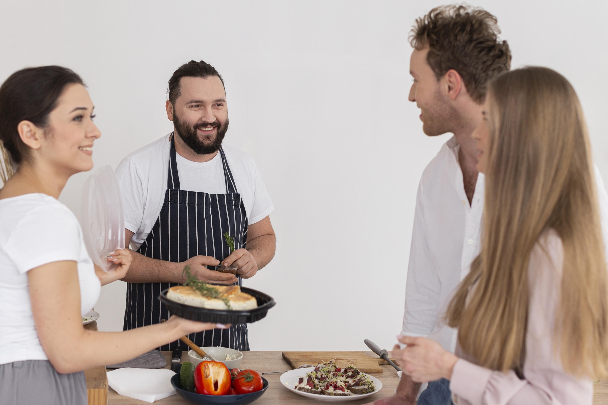 Participants tasting dishes